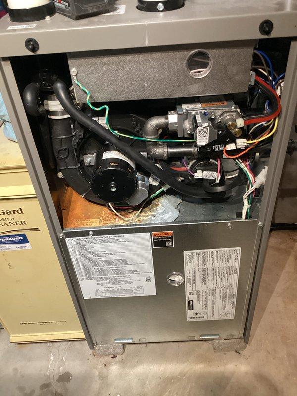 Performed comprehensive tune-up and safety inspection on residential gas furnace system. Accessed internal components, verified proper operation of blower motor and gas valve assembly, inspected electrical connections and wiring harnesses, checked intake and exhaust venting system, and replaced air filter to ensure optimal system performance and efficiency.
