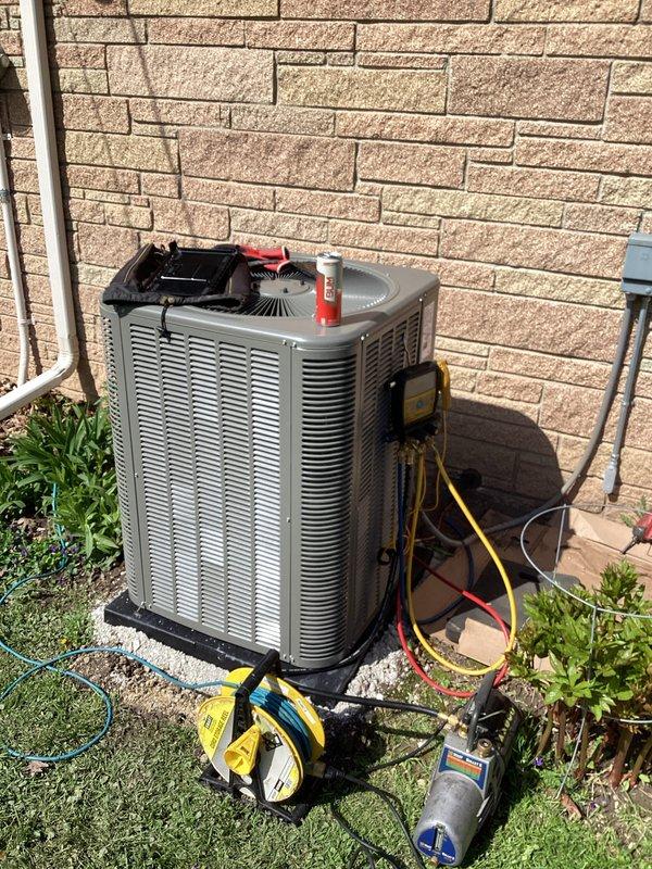 Completed installation of new air conditioning condenser unit and evaporator coil system. Performed evacuation and vacuum testing to verify system integrity, achieving proper micron levels as confirmed by digital manifold gauge readings. Charged system with refrigerant to manufacturer specifications using manifold gauge set, verified proper system pressures, and conducted final operational testing to ensure optimal performance of the new HVAC equipment.