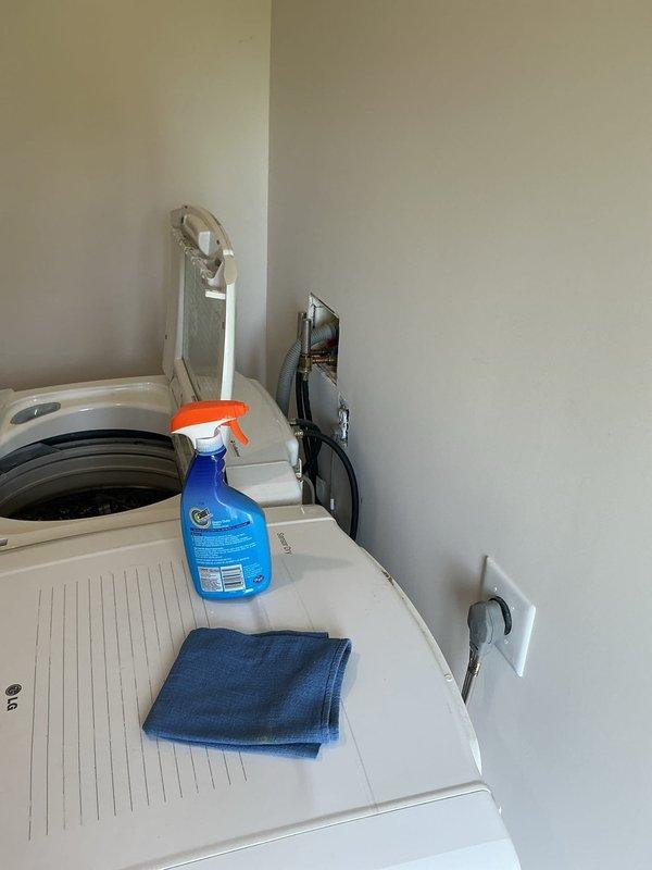 # Plumbing Service - Inspection

Conducted routine plumbing inspection of laundry room area, examining water supply lines, drain connections, and shut-off valves serving two top-loading washing machines. Verified proper installation of supply hoses, checked for signs of leaks or water damage on walls and flooring, and confirmed adequate drainage function. All plumbing components were found to be in satisfactory working condition with no immediate service requirements identified.