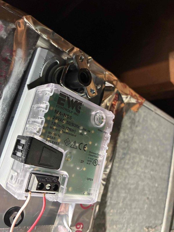 Performed diagnostic testing and inspection of HVAC system electrical controls and components. Utilized digital multimeter to verify proper voltage and amperage readings at the HZ432 control module and associated terminal connections. Inspected and documented the EYS Controls board mounted on the air handler unit, confirming all LED indicators functioning properly and digital display showing correct operational parameters. Verified all wire connections at terminal strips were secure and properly terminated, with no signs of overheating or damage to conductors. All system controls tested within manufacturer specifications and unit operating normally upon completion of service inspection.