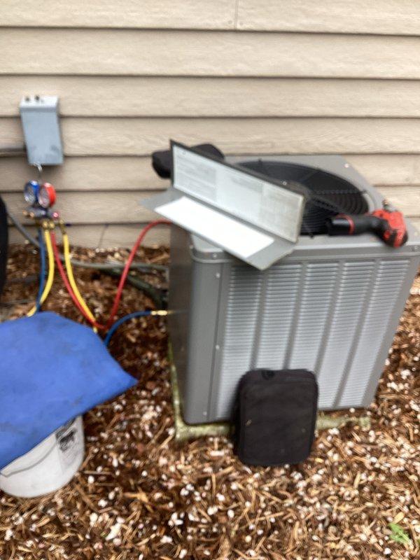 Performed complete tune-up and diagnostic evaluation on residential air conditioning system. Connected manifold gauges to verify refrigerant pressures and system performance, inspected condenser unit operation, and ensured all electrical connections and components were functioning within manufacturer specifications. All system parameters tested normal with unit operating efficiently.