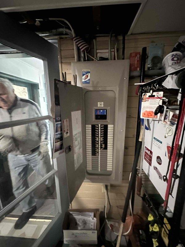Conducted comprehensive HVAC system assessment in basement utility area to provide replacement estimate. Evaluated existing Carrier furnace/air handler unit, associated galvanized metal ductwork system, and electrical panel configuration to determine equipment specifications and installation requirements. Documented current system layout including rectangular trunk lines, branch ducts, and insulated duct sections to plan for new equipment integration with existing infrastructure while ensuring proper sizing and compatibility for optimal system performance.