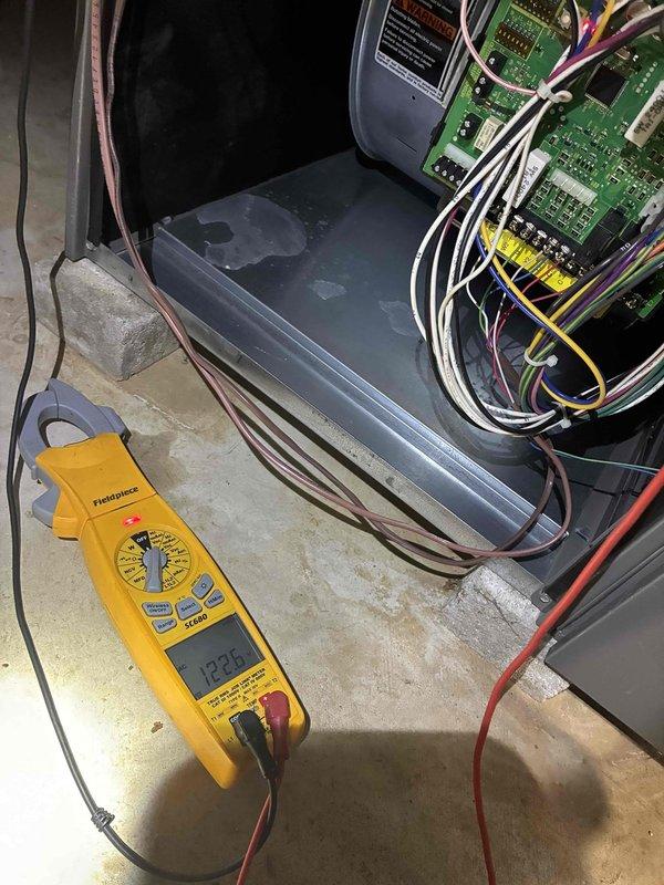 Completed comprehensive tune-up service on gas furnace and air conditioning system. Performed electrical diagnostics using digital multimeter, measuring voltage and amperage readings on HVAC control board and system components to verify proper operation. All systems tested and found operating within manufacturer specifications.