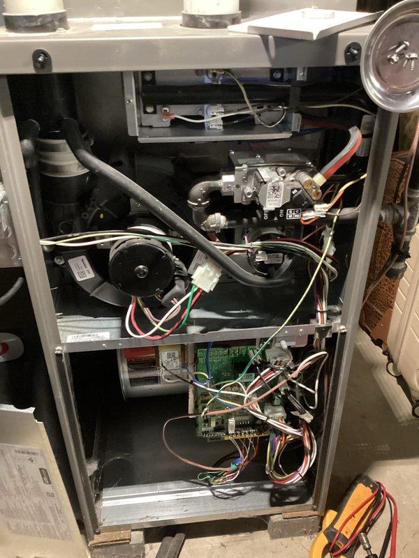 Completed comprehensive HVAC tune-up and system diagnostics on residential gas furnace unit. Performed detailed inspection of all internal components including blower motor assembly, gas valve, burner assembly, and control board. Utilized Testo 510 II diagnostic meter to measure and verify system pressures and temperatures, confirming optimal operating parameters. All electrical connections, wiring harnesses, and safety controls were inspected and found to be secure and functioning properly. System tested and verified to be operating within manufacturer specifications.