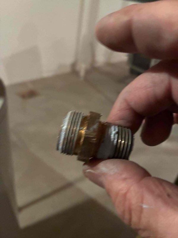 Responded to gas leak service call and performed thorough inspection of HVAC system and gas connections. Located faulty brass pipe fitting with worn threading and surface deterioration that was compromising the gas line seal. Removed defective connector and replaced with new properly-rated brass fitting, ensuring all threads were clean and connections were torqued to manufacturer specifications. Conducted leak test using approved detection methods to verify complete seal integrity throughout the gas supply system. Inspected Lennox furnace unit and associated piping connections for any additional concerns. All gas lines tested and confirmed leak-free with system restored to safe operating condition.