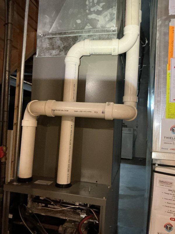 Completed furnace and air conditioning tune-up for new homeowner requesting equipment evaluation. Performed comprehensive inspection of HVAC system including furnace/air handler unit and associated condensate drainage system with PVC piping configuration. All equipment found to be in proper working order with clean installation and adequate drainage lines functioning correctly.