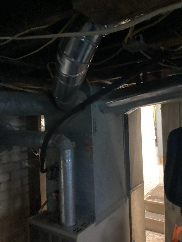 Responded to no-heat call for 1998 gas furnace. Upon arrival, performed diagnostic inspection of aging forced-air heating system located in basement utility area. Assessed furnace operation, verified gas supply, checked electrical connections, and inspected heat exchanger and burner assembly for signs of failure or safety concerns. Given the age of the unit at 26+ years old, evaluated whether system could be temporarily restored to operation or if replacement was necessary. Documented equipment condition with photos and provided findings to customer who had already scheduled replacement estimate.