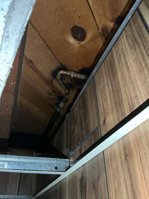 Performed diagnostic evaluation of multiple exterior hose bibs experiencing minor leaks. Assessed existing non-frost-free spigots for replacement with frost-free models to prevent freeze damage. Inspected copper supply line routing through interior wall framing and exterior mounting locations on brick veneer. Recommended replacement of 2-3 hose bibs with frost-free units, including proper installation depth and pitch requirements for adequate drainage and freeze protection.