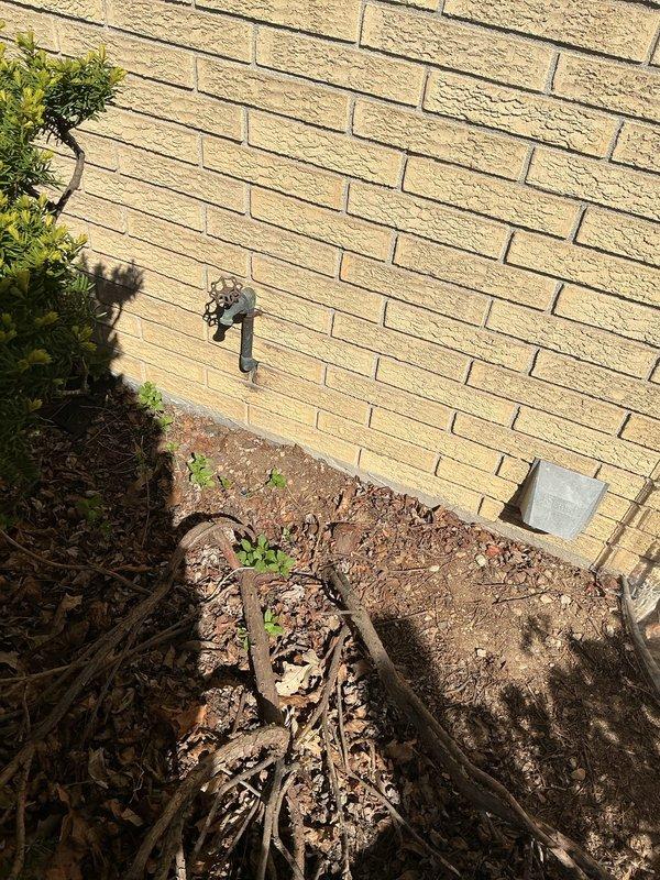 Performed diagnostic evaluation of multiple exterior hose bibs experiencing minor leaks. Assessed existing non-frost-free spigots for replacement with frost-free models to prevent freeze damage. Inspected copper supply line routing through interior wall framing and exterior mounting locations on brick veneer. Recommended replacement of 2-3 hose bibs with frost-free units, including proper installation depth and pitch requirements for adequate drainage and freeze protection.