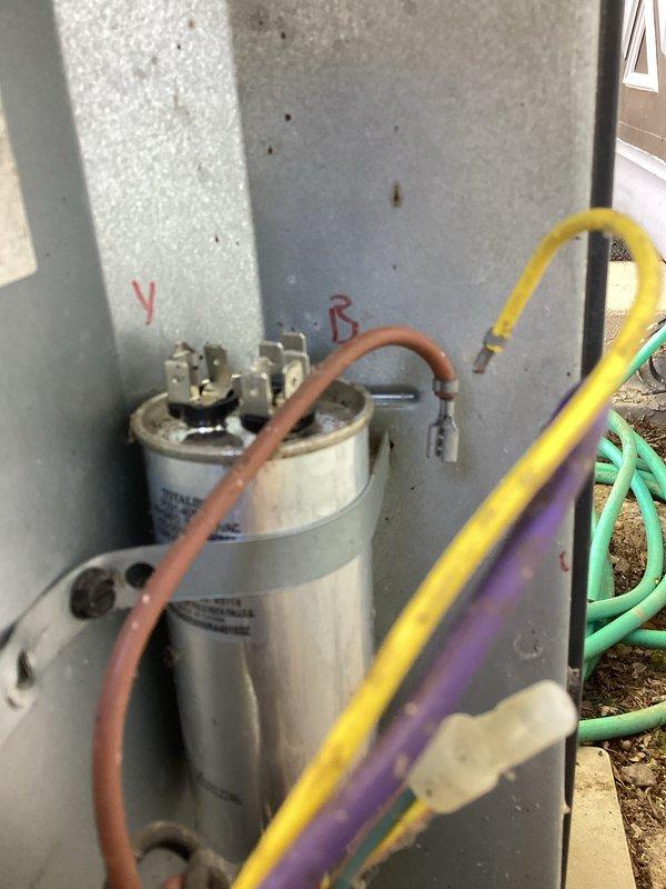 Completed prepaid membership cooling maintenance visit on residential air conditioning system. Performed standard seasonal inspection of outdoor condenser unit, including visual assessment of cabinet condition and component integrity. Connected manifold gauge set to measure refrigerant pressures and verify system charge levels. Inspected electrical components including run capacitor and associated wiring connections, confirming proper terminal connections and component functionality. All system parameters found operating within normal specifications.