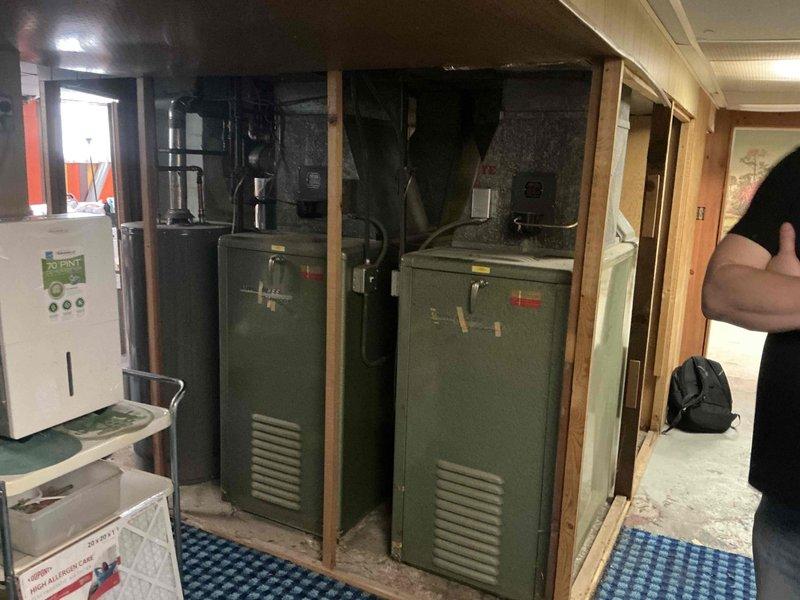 Conducted on-site assessment of existing duplex heating system consisting of two furnaces requiring replacement. Evaluated current equipment condition, including gas valve assemblies, piping connections, and cabinet structures. Documented existing HVAC installations through detailed photography to support replacement estimate preparation for both heating units.