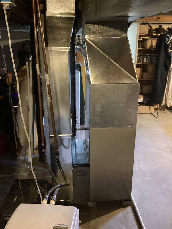 Completed installation of Carrier 58SB0B 45,000 BTU 80% AFUE gas furnace in residential basement location. Unit was properly positioned, leveled, and secured with all necessary gas line connections, electrical hookups, and venting installed per manufacturer specifications. Ductwork was connected to existing system infrastructure, and condensate drainage was routed appropriately. All installation documentation, including owner's manual and warranty information, was completed and left with equipment for homeowner reference.