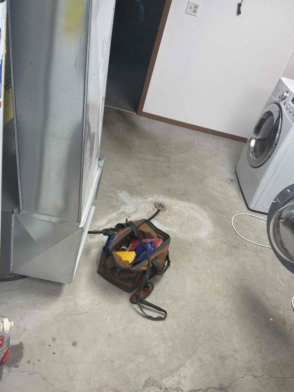 Conducted on-site assessment for non-functional 40-gallon water heater replacement in residential utility area. Evaluated existing installation, documented current equipment condition and workspace configuration, and provided comprehensive replacement estimate to customer.