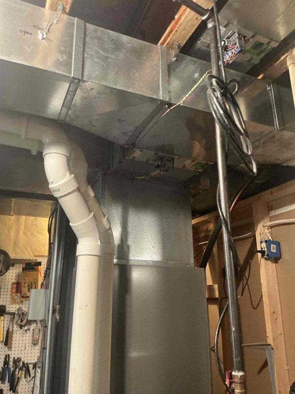 Responded to emergency AC service call and conducted comprehensive estimate for HVAC system replacement. Evaluated existing ductwork system in mechanical room, assessed condition of ventilation components, electrical connections, and exterior infrastructure including foundation penetrations and weathered ventilation channels. Documented current system configuration with detailed photographic evidence to support replacement recommendations.