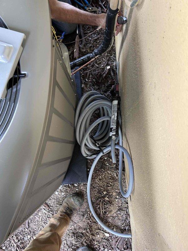 Completed full HVAC system installation including new furnace and air conditioning unit. Installed outdoor condensing unit with proper refrigerant line connections and indoor air handler with associated ductwork and electrical connections. Retrieved customer's space heater from premises and left it available for their use.
