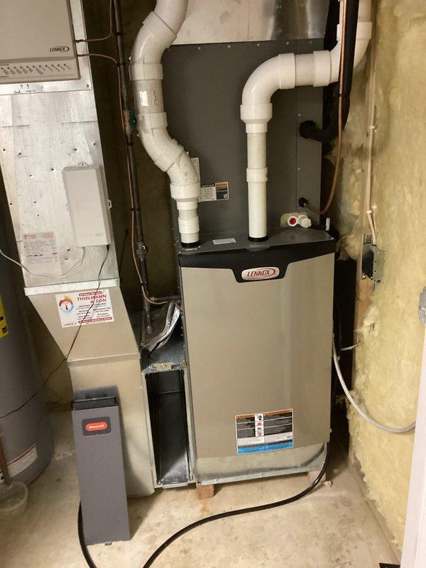 Completed prepaid maintenance visit addressing dehumidifier with clogged condensate line. Cleared blockage and restored proper drainage function. Inspected dehumidifier filter (17.5x14x1.75) and confirmed washable type for customer maintenance. Performed routine cooling system inspection on Lennox HVAC equipment including indoor furnace unit and outdoor condenser. Connected service gauges to outdoor unit and verified refrigerant pressures and system operation. All equipment operating within normal parameters following service completion.
