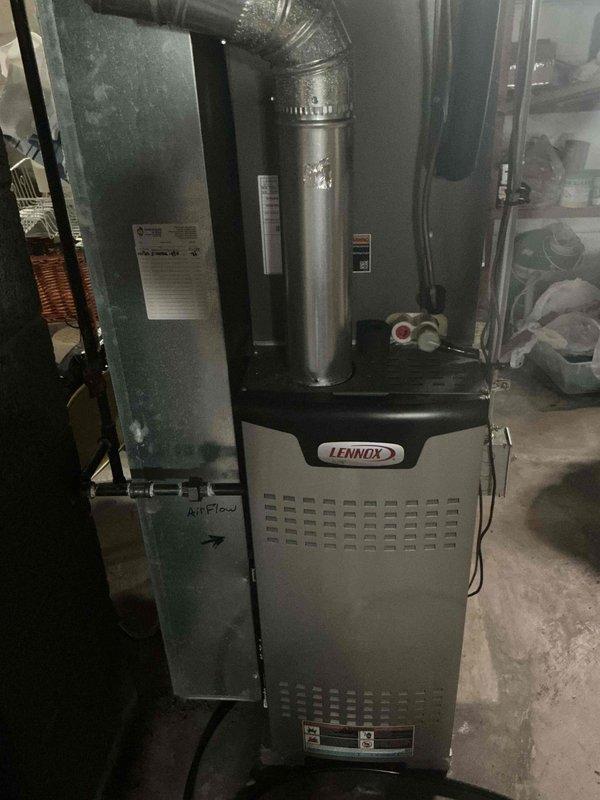 Completed preventive maintenance tune-up on residential Lennox furnace system. Performed comprehensive system inspection including visual examination of furnace cabinet, air handler, and ductwork connections. Verified proper airflow direction on evaporator coil cabinet and checked all electrical connections for secure termination. Conducted electrical diagnostics using digital multimeter to measure system voltage and capacitance readings, confirming all components operating within manufacturer specifications. All safety controls tested and functioning properly, system ready for continued operation.
