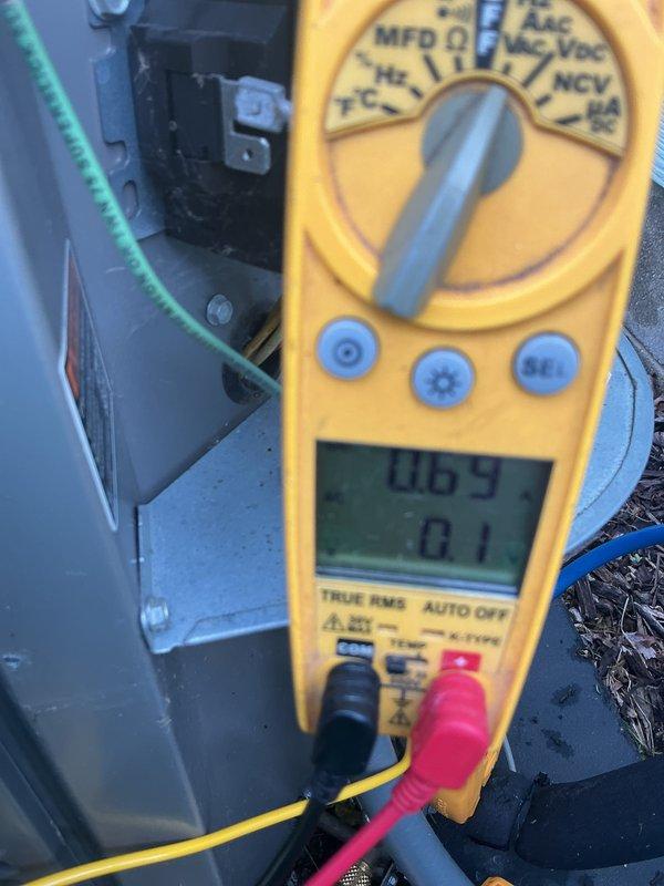 Completed preventive maintenance tune-up on residential Lennox furnace system. Performed comprehensive system inspection including visual examination of furnace cabinet, air handler, and ductwork connections. Verified proper airflow direction on evaporator coil cabinet and checked all electrical connections for secure termination. Conducted electrical diagnostics using digital multimeter to measure system voltage and capacitance readings, confirming all components operating within manufacturer specifications. All safety controls tested and functioning properly, system ready for continued operation.