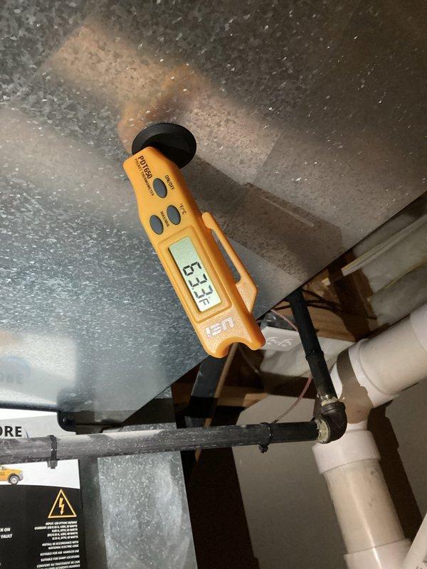 Completed AC spring start-up service with system diagnostics and temperature verification. Supply air temperature measured at 53.3°F and return air at 69.0°F, confirming proper system operation and adequate temperature differential for cooling mode. All equipment functioning within normal parameters.