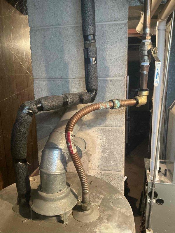 Responded to emergency call for flooded basement affecting HVAC equipment. Conducted on-site assessment and documented existing water heater and furnace conditions for replacement estimate, noting significant water damage, mineral deposits, and aging infrastructure including corroded plumbing connections and compromised sump pump system.