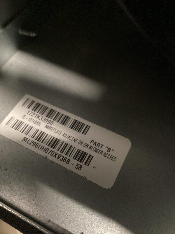 Responded to service call for furnace noise complaint. Inspected internal components and blower assembly. Documented equipment model ML260UH070AV3RB with photos of motor assembly, piping connections, and component identification labels for warranty records.