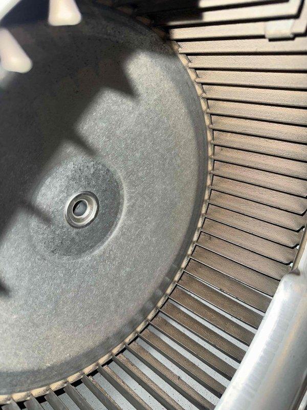 Performed blower wheel cleaning on HVAC system. Removed accumulated dust and debris from squirrel cage blower assembly, including all fins and blades, to restore proper airflow and system efficiency.