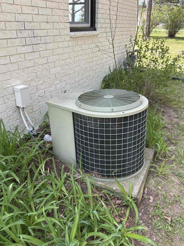 Conducted comprehensive estimate for complete HVAC system replacement including aging furnace and air conditioning unit located in basement mechanical room. Both units currently operational but have exceeded recommended service life and require replacement to ensure continued reliability and efficiency. Documented existing equipment configuration including outdoor condensing unit, refrigerant lines, ductwork connections, and basement furnace installation with supporting photography for proposal development.