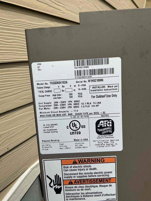 Completed prepaid membership cooling maintenance visit on outdoor condensing unit, model TCGDQ96411SA. Performed comprehensive system inspection, verified electrical specifications at 208-230V 1PH 60HZ, and conducted diagnostic testing using calibrated multimeter to measure voltage and amperage readings across capacitor and electrical components. All measurements within manufacturer specifications, unit operating properly with no deficiencies noted.
