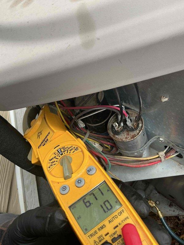 Completed prepaid membership cooling maintenance visit on outdoor condensing unit, model TCGDQ96411SA. Performed comprehensive system inspection, verified electrical specifications at 208-230V 1PH 60HZ, and conducted diagnostic testing using calibrated multimeter to measure voltage and amperage readings across capacitor and electrical components. All measurements within manufacturer specifications, unit operating properly with no deficiencies noted.