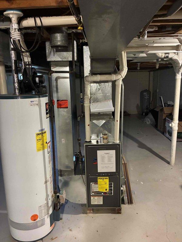 Completed estimate for adding central air conditioning system to existing home with gas furnace located in basement. Assessed current heating equipment, ductwork configuration, and available space for outdoor condenser placement. Documented existing furnace condition and basement mechanical room layout, noting adequate clearance for AC coil installation above furnace and proper venting infrastructure already in place. Provided homeowner with equipment options and installation requirements for integrating new cooling system with existing forced-air heating system.