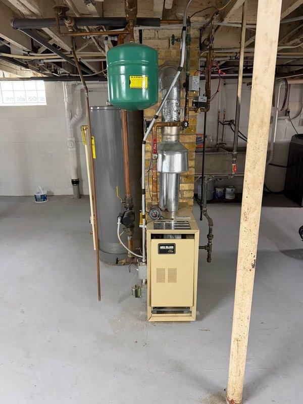 Responded to no heat call on a two-zone hydronic boiler system. Upon arrival, found the zones were not operating independently as designed. Performed diagnostic evaluation of the boiler, circulator pumps, zone valves, and associated controls. Inspected gas valve, burner assembly, and all electrical connections within the heating unit. Verified proper operation of expansion tank, air separator, and piping configuration. Tested system controls and thermostats to ensure proper zone isolation and independent operation. Restored heat to the residence and confirmed both zones were functioning correctly before departure.