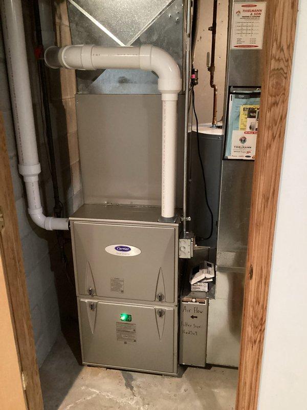 Completed comprehensive AC tune-up on Carrier system, including indoor furnace and outdoor condenser unit inspection. Performed standard maintenance procedures with refrigerant pressure testing using manifold gauges, electrical component verification, and system operational checks. All equipment found operating within normal parameters with no issues identified during service visit.
