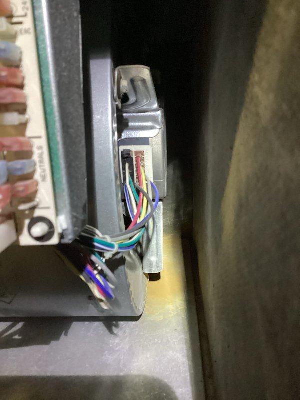 Responded to no heat call on residential furnace system less than 10 years old. Upon arrival, performed diagnostic inspection of unit and electrical connections. Inspected control board wiring, terminal connections, and all associated electrical components to identify cause of heating failure. All wire connections at control board were examined and found to be secure with proper color-coded wiring intact. Verified system operation and completed scheduled tune-up maintenance as requested.