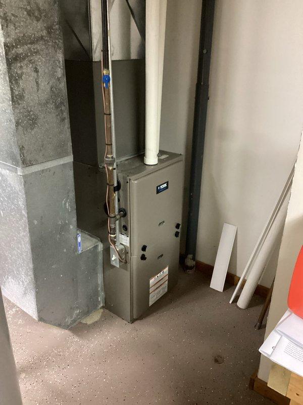 Responded to no heat call on residential furnace system less than 10 years old. Upon arrival, performed diagnostic inspection of unit and electrical connections. Inspected control board wiring, terminal connections, and all associated electrical components to identify cause of heating failure. All wire connections at control board were examined and found to be secure with proper color-coded wiring intact. Verified system operation and completed scheduled tune-up maintenance as requested.