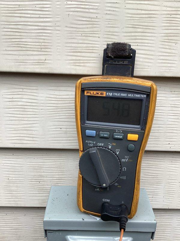 Responded to service call for reported leak in furnace piping previously identified by utility company. Performed diagnostic inspection of HVAC system including electrical testing with digital multimeter and thorough examination of outdoor condensing unit components. Inspected capacitor, contactor assembly, and associated wiring connections to assess overall system condition during tune-up service.