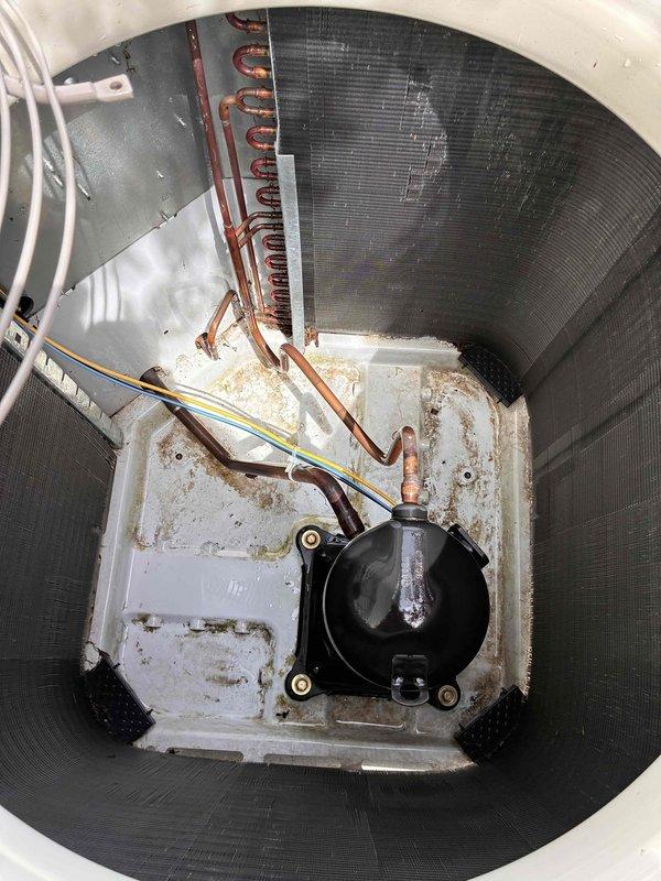 Performed routine maintenance and tune-up on residential air conditioning system. Conducted electrical diagnostics using digital multimeter, verifying proper voltage and capacitance readings on outdoor condensing unit. Inspected evaporator coil assembly and blower motor, noting moderate corrosion and staining on drain pan that will require monitoring for potential future replacement.