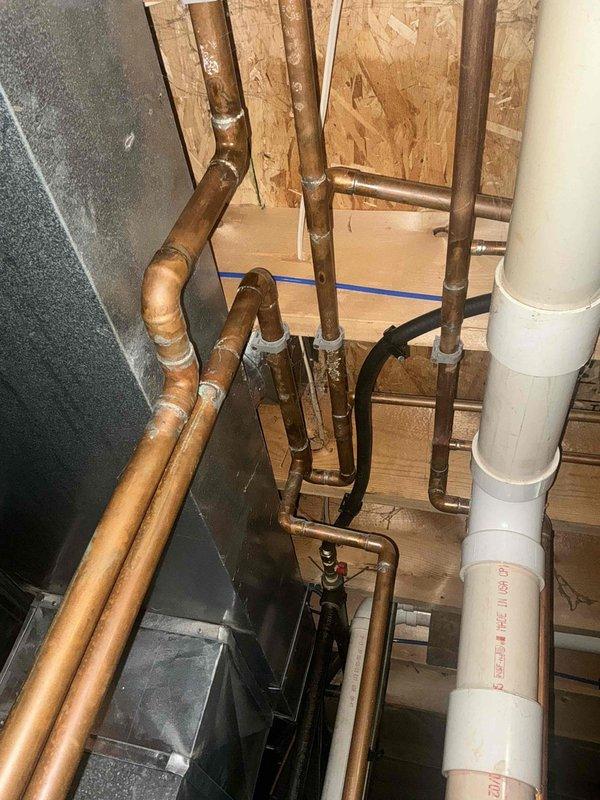 Conducted estimate for replacement of existing water heater installed in 2002. Evaluated current installation including ductwork, plumbing configuration with PEX piping, and available space in mechanical room. Discussed tankless water heater options with customer as alternative to conventional tank-style unit, reviewed installation requirements, venting considerations, and system specifications suitable for the property.