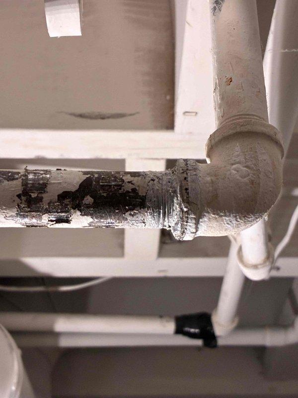 Responded to gas line repair per approved estimate. Upon arrival, located severely deteriorated and corroded gas piping in basement utility area showing extensive black discoloration and material degradation. Replaced damaged section of gas line with new approved piping and fittings. Tested all connections for leaks using approved methods and verified system integrity. Restored gas service to safe operating condition and confirmed proper operation of all affected equipment.