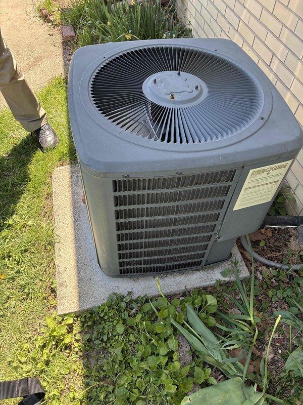 Responded to service call for air conditioning unit producing clunking noise during operation. Upon arrival, inspected outdoor condenser unit and surrounding components, documented equipment condition with photographs showing unit properly positioned on concrete pad with adequate clearance and access to refrigerant lines and electrical connections. Conducted operational assessment to identify source of mechanical noise and verified system functionality.