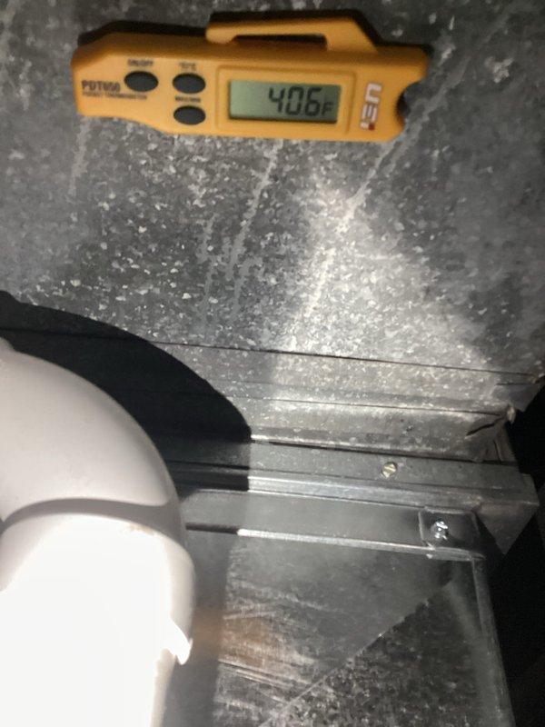 Completed air conditioning system startup and commissioning on newly installed unit. Performed comprehensive system diagnostics using digital manifold gauge set, recording refrigerant pressures and temperatures across the system. High side pressure measured at 910 psig with 226.5°F temperature, low side pressure at 18.4 psig with 123°F temperature, indicating proper refrigerant charge and system operation. Verified supply air temperature at 40.6°F at the ductwork, confirming adequate cooling capacity and proper airflow through the evaporator coil. All system parameters within manufacturer specifications, unit operating as designed with no deficiencies noted.