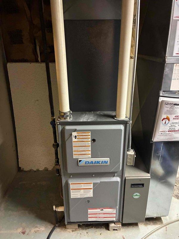 Performed comprehensive AC tune-up on Daikin HVAC system, addressing customer concern regarding a potentially misplaced metal component. Conducted full system inspection, verified all mechanical components were properly secured and positioned, checked refrigerant pressures using manifold gauge set on R-410A system, and confirmed unit startup and operational performance. All components found to be correctly installed with system operating within manufacturer specifications.