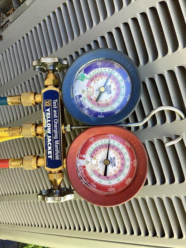 Performed comprehensive AC tune-up on Daikin HVAC system, addressing customer concern regarding a potentially misplaced metal component. Conducted full system inspection, verified all mechanical components were properly secured and positioned, checked refrigerant pressures using manifold gauge set on R-410A system, and confirmed unit startup and operational performance. All components found to be correctly installed with system operating within manufacturer specifications.