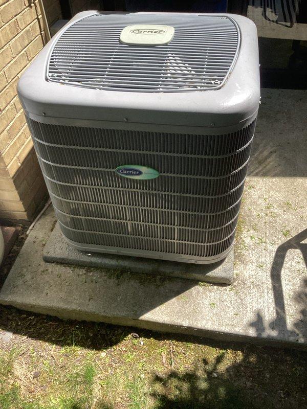 Completed annual cooling system maintenance visit under membership agreement. Performed comprehensive AC tune-up on Carrier outdoor condensing unit, including inspection of condenser coils, electrical connections, and refrigerant levels. Noted significant deterioration of indoor drain pan with extensive rust and corrosion requiring future replacement, though system remains operational at this time.