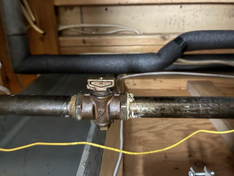 Responded to no hot water complaint at property that had been vacant for several months. Inspected 40-gallon A.O. Smith gas water heater installed in 2019 located in attic space. Found pilot light extinguished, likely due to extended period of non-use. Relit pilot light, verified proper ignition sequence, and confirmed burner operation. Tested hot water delivery at fixtures and verified system returned to normal operation with adequate temperature and pressure.