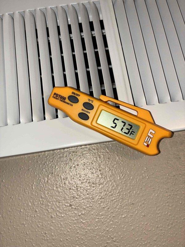 Completed routine cooling maintenance visit on Magic Pak HVAC system as part of recurring membership agreement. Performed system inspection including electrical components, control board, capacitor, and relay connections within the unit cabinet. Verified proper airflow and measured supply air temperature at 57.3°F through the vent register, confirming adequate cooling performance and system operation within normal parameters.