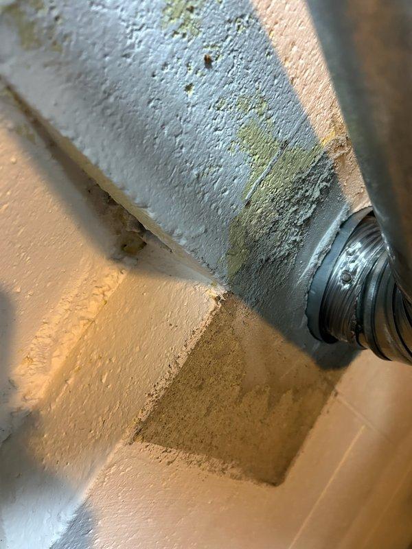 Responded to water heater inspection findings regarding loose flue connection. Upon arrival, assessed the flue pipe assembly and confirmed inadequate sealing at connection points, which poses potential safety concerns for proper venting of combustion gases. Documented current condition of flue components showing signs of deterioration and improper securing. Advised of necessary repairs to secure and seal flue connections to meet code requirements and ensure safe operation of tanked water heater system.