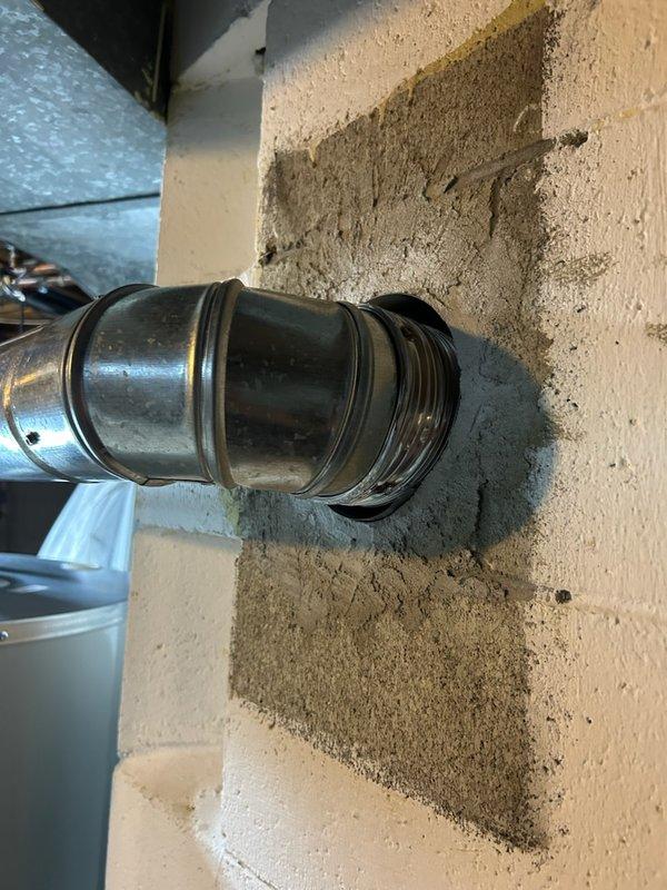 Responded to water heater inspection findings regarding loose flue connection. Upon arrival, assessed the flue pipe assembly and confirmed inadequate sealing at connection points, which poses potential safety concerns for proper venting of combustion gases. Documented current condition of flue components showing signs of deterioration and improper securing. Advised of necessary repairs to secure and seal flue connections to meet code requirements and ensure safe operation of tanked water heater system.