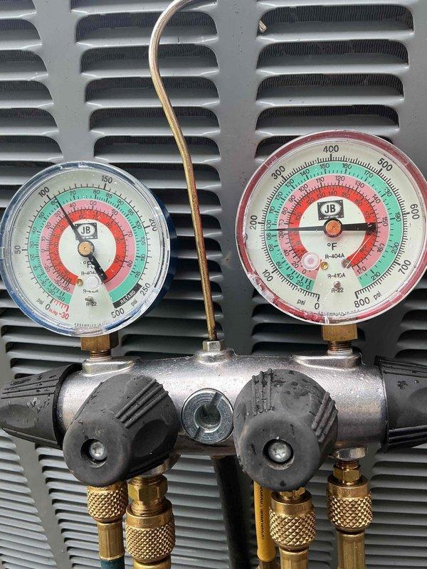 Completed routine HVAC tune-up on system greater than 10 years old. Performed refrigerant pressure testing using manifold gauge set and verified electrical components with digital multimeter to ensure proper system operation and performance within manufacturer specifications.