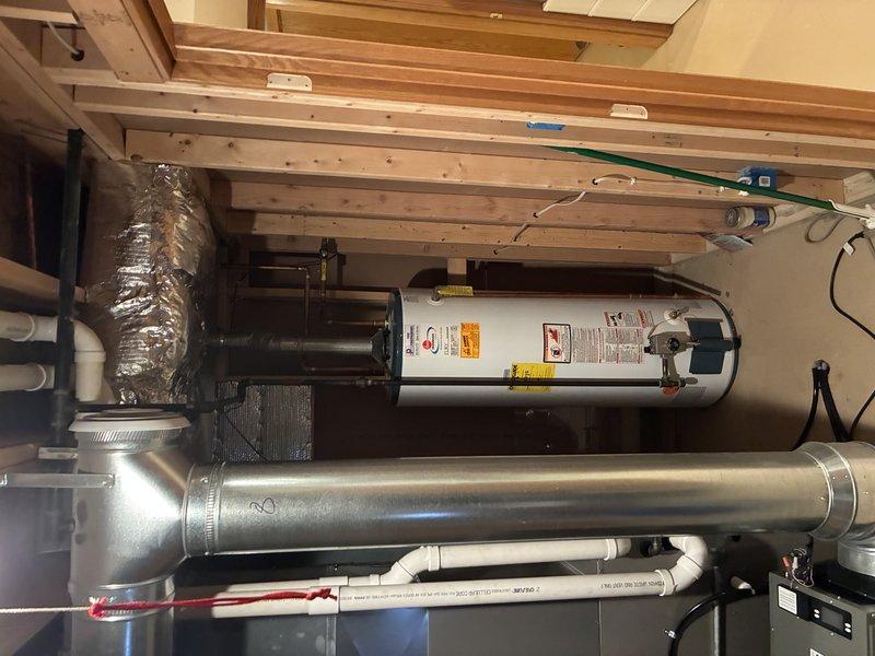 Responded to service call for inadequate water heating performance. Performed diagnostic inspection of tanked water heater system to identify cause of insufficient heat output. Examined water heater unit, tested thermostat settings, inspected heating elements, and evaluated overall system operation. Assessed copper supply and discharge plumbing connections for proper function. Provided findings and recommendations to address heating deficiency issue.