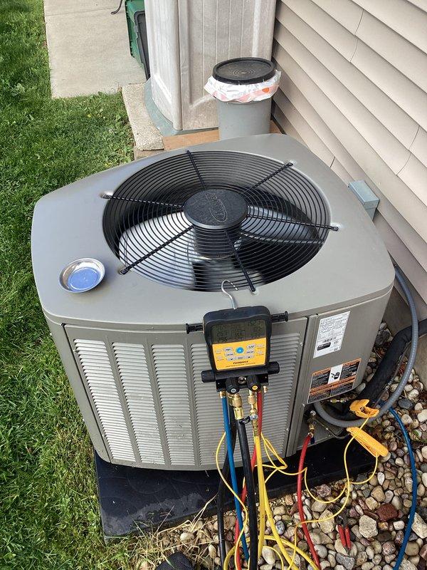 Completed routine cooling system maintenance visit as part of recurring membership agreement. Connected digital manifold gauges to outdoor condenser unit to measure system pressures and temperatures, verifying proper refrigerant charge levels and overall system performance. All diagnostic readings were within normal operating parameters, confirming the air conditioning system is functioning correctly for the cooling season.